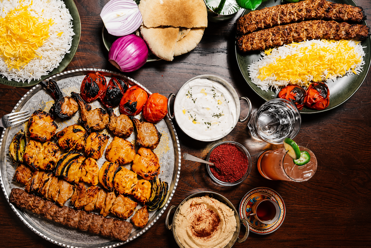 A Persian feast: saffron rice, kebab, herbs, and bread